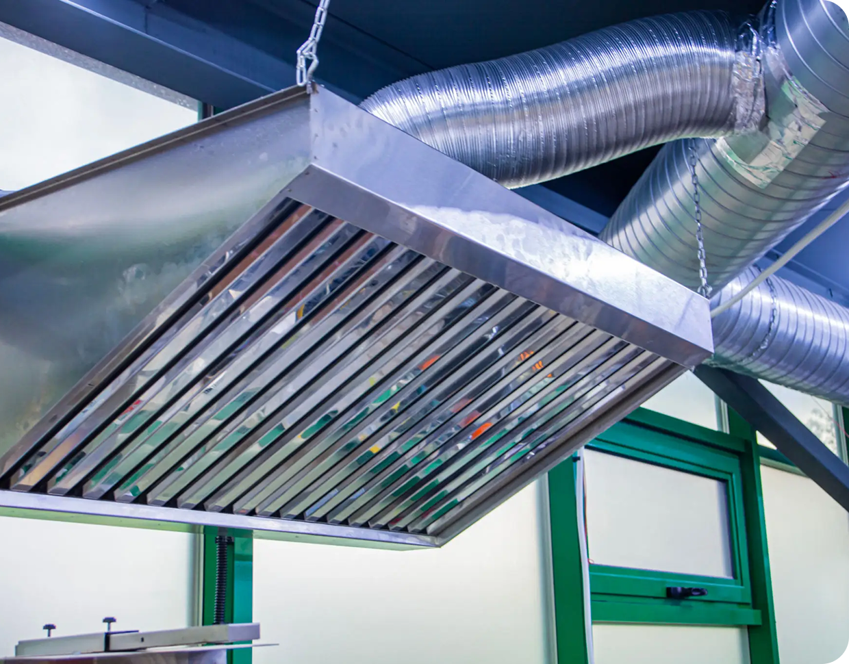 Commercial kitchen ventilation hood and ducts.